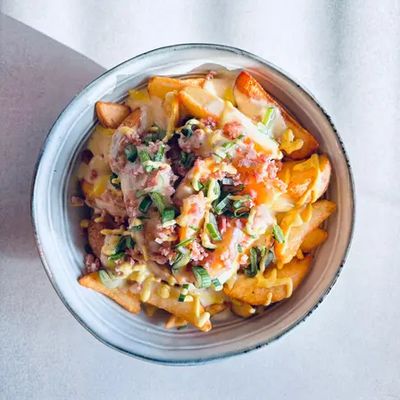 PAPAS CON SALSA DE QUESO