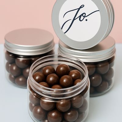 Grajeas de avellana europea en chocolate de leche