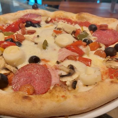 La Pizza Nostra ( De La Casa ).