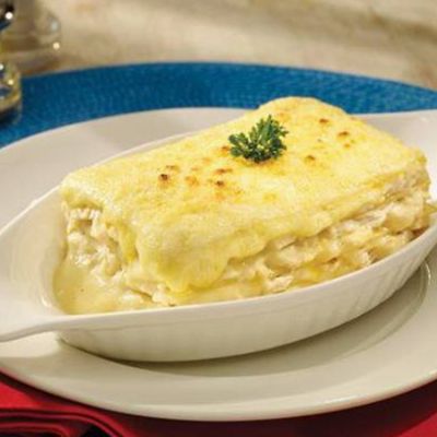 Lasagna Pollo + Tostadas + Acompañamiento