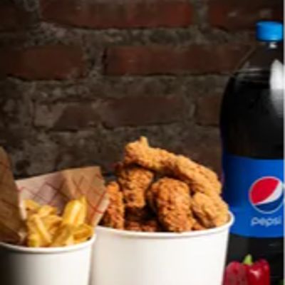 15 alitas crispy con papas fritas grandes y bebida